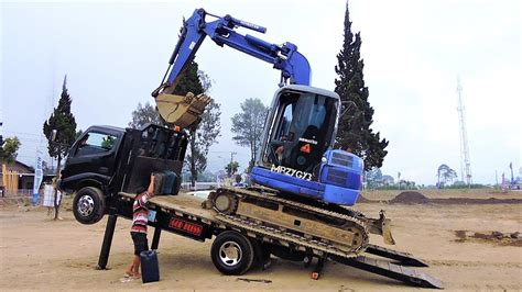 mini excavation loaded in a pickup truck|45 50 mini truck.